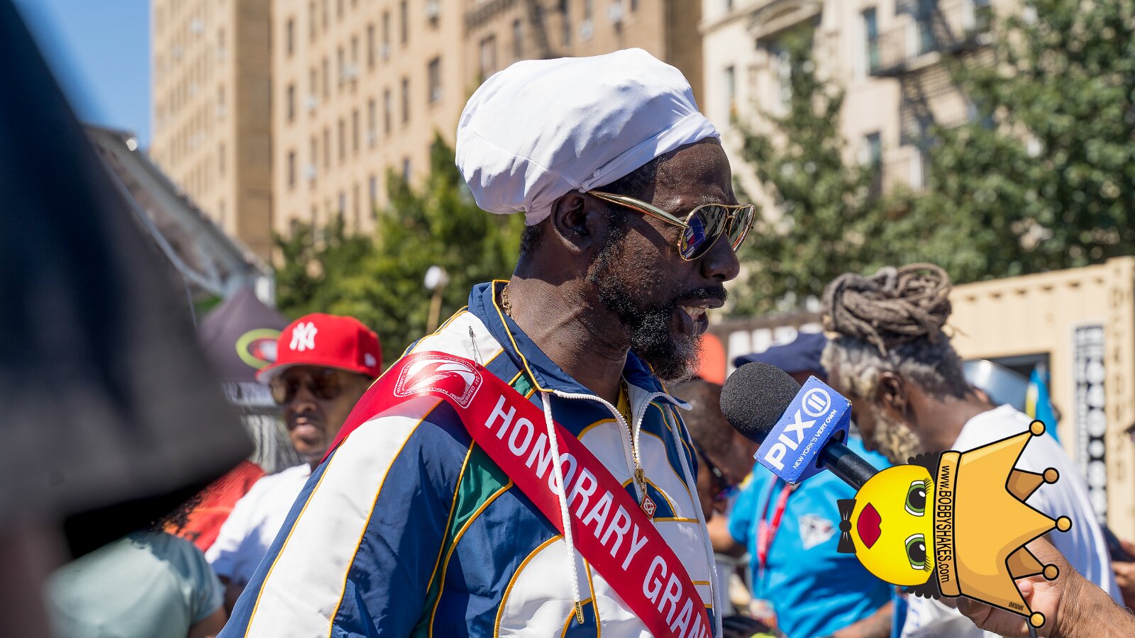 Buju Banton & Kes, Honorary Grand Marshals performing live at Eastern Parkway in Brooklyn, NY, photographed by Anil Batra, Picatra Music Journal