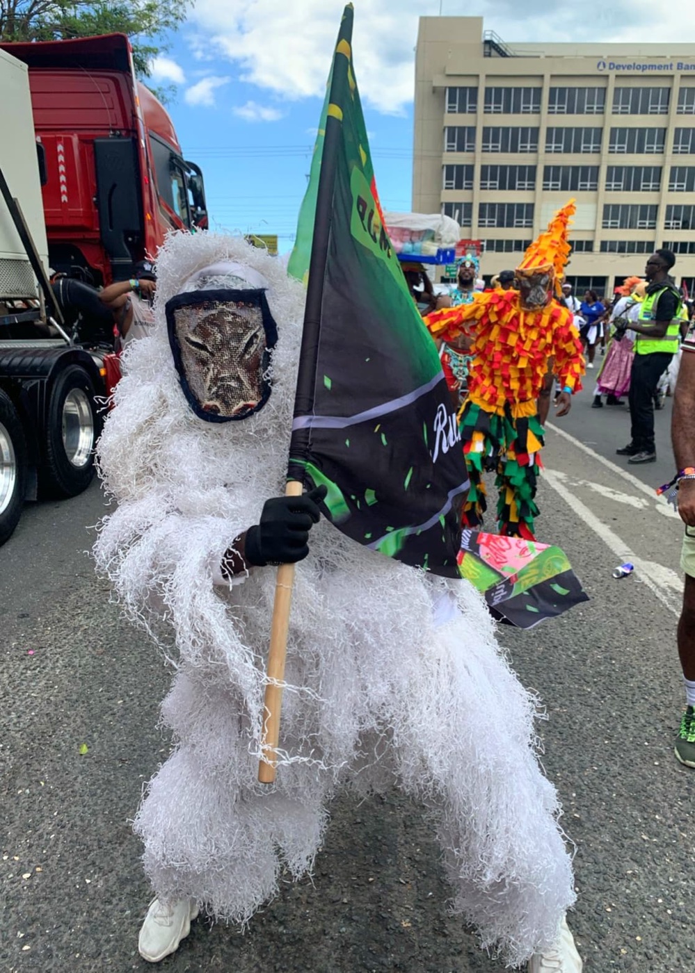Jonkonnu characters on the road at the Jamaica Carnival parade, April 2025. Photo: Xaymacan, CC BY-SA 4.0, via Wikimedia Commons.